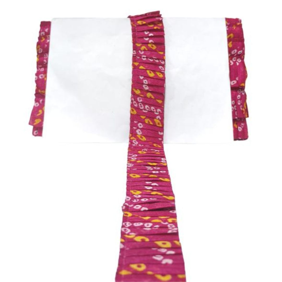 White shirt with pink floral patterned straps on a white background
